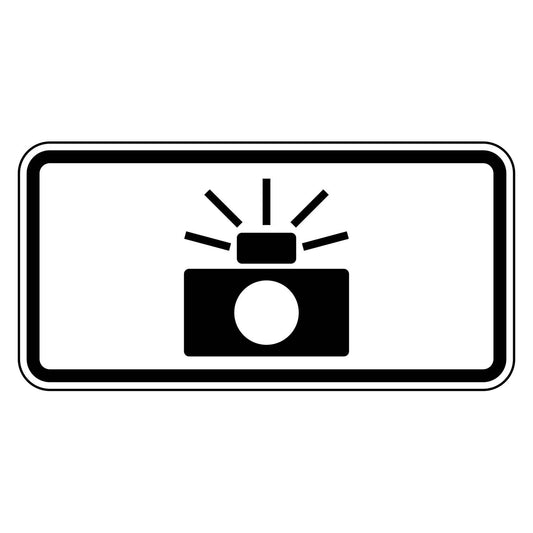 Black camera symbol with "PHOTO ENFORCED" legend on a white retroreflective plaque.