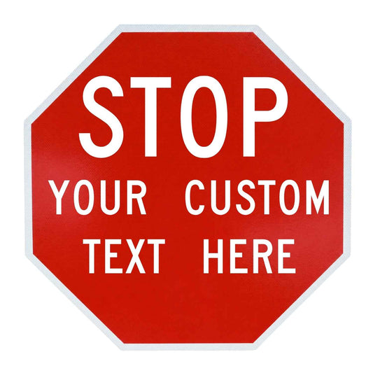 Octagonal red metal stop sign with a white border and customizable white text on a reflective surface.