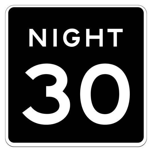 Black square Night 30 MPH speed limit plaque with white text, indicating a reduced nighttime speed.