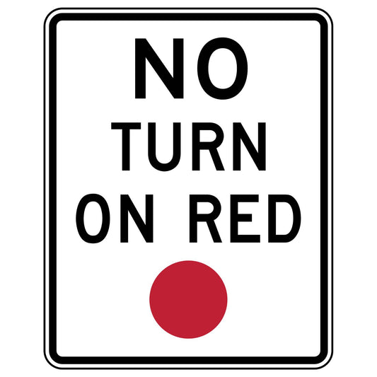 White retroreflective "NO TURN ON RED" sign with black text and a red circle.