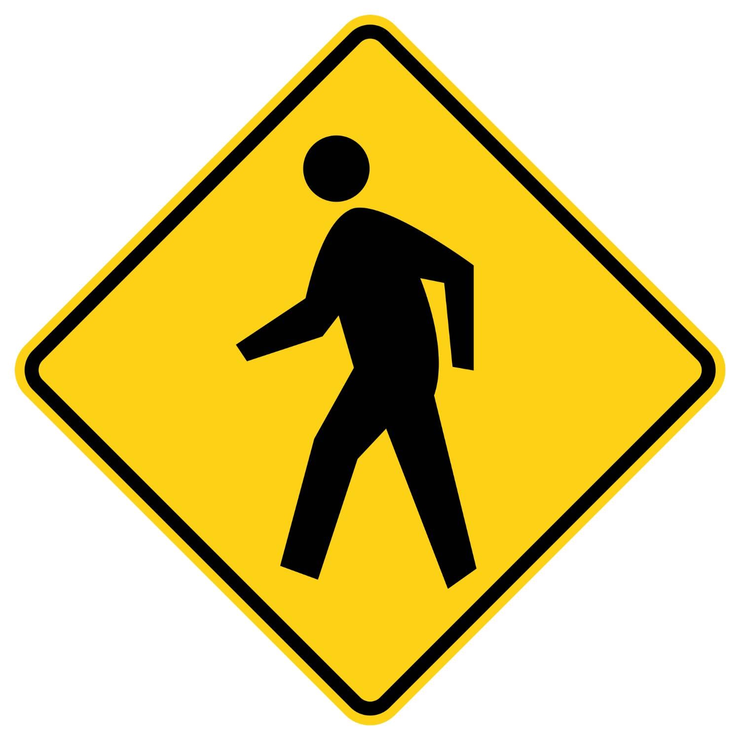 Yellow diamond-shaped W11-2 pedestrian crossing sign with a black walking person symbol.