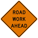 Fluorescent orange diamond "ROAD WORK AHEAD" sign with black text and border, W20-1.