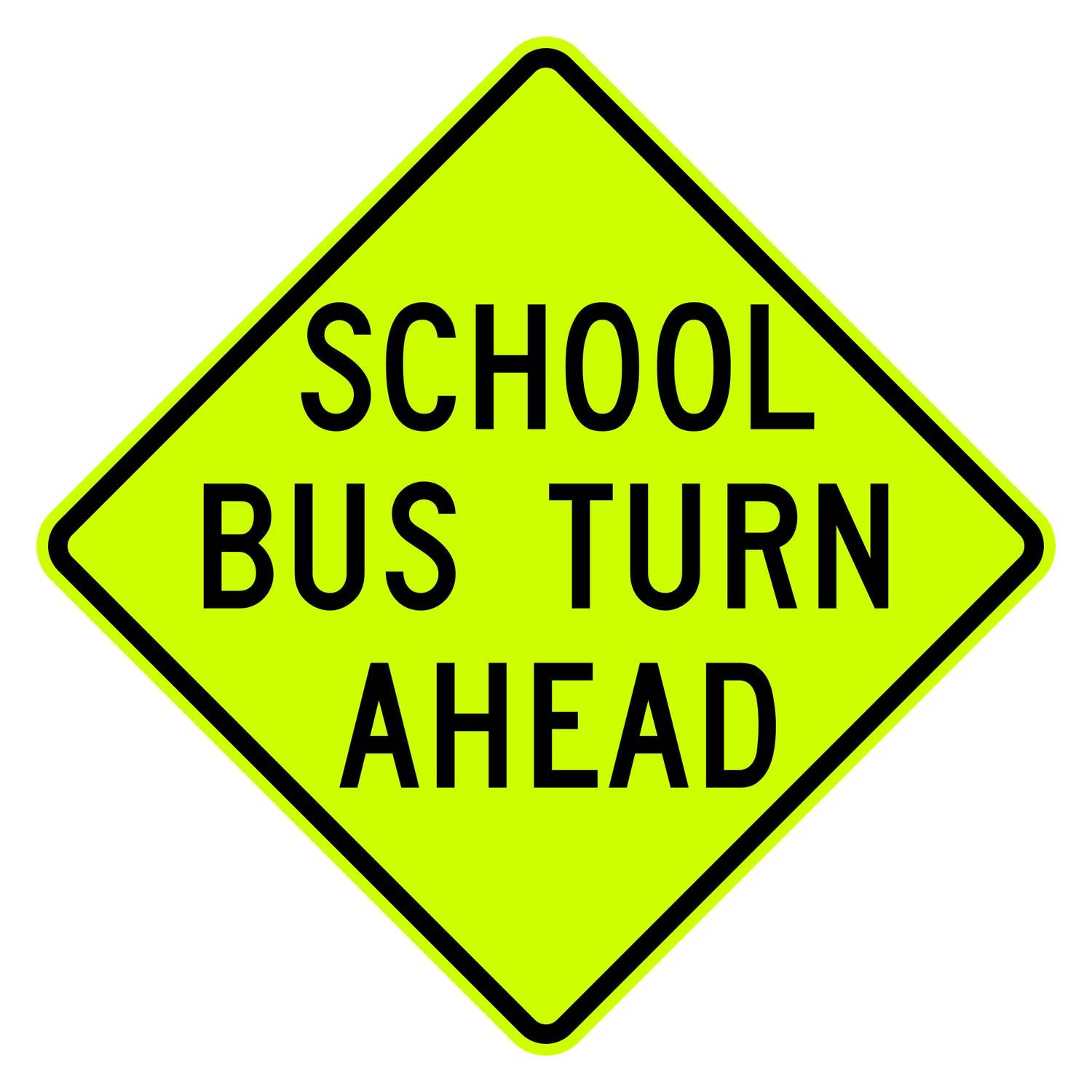 Fluorescent yellow-green diamond sign with "SCHOOL BUS TURN AHEAD" in black text.