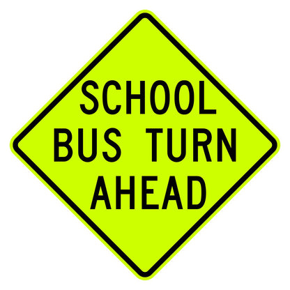 Fluorescent yellow-green diamond sign with "SCHOOL BUS TURN AHEAD" in black text.