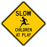 Yellow diamond "SLOW CHILDREN AT PLAY" sign with black text and running child symbol.