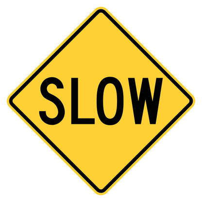 Slow Sign - yellow diamond sign reading SLOW in black letters