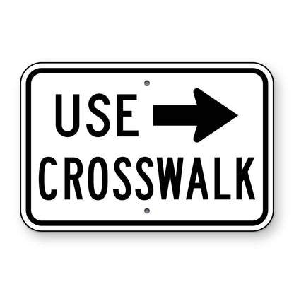 Use Crosswalk with Right Arrow Plaque R9-3bP - white horizontal rectangle sign reading USE CROSSWALK with a black right arrow