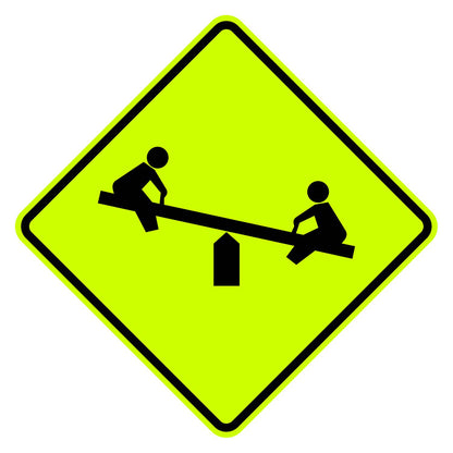 Yellow diamond-shaped W15-1 playground sign featuring a black silhouette of children on a seesaw.