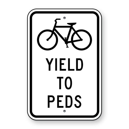 Bicycles Yield to Pedestrians Sign R9-6 - white vertical rectangle sign with a black bicycle symbol above the words YIELD TO PEDS