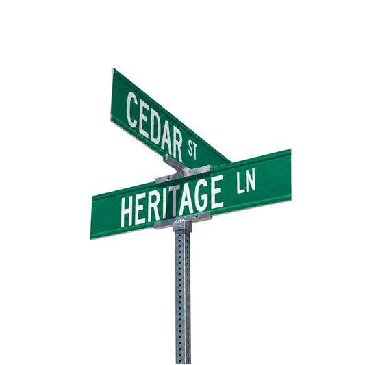 MUTCD Compliant Custom Extruded Blade Street Name Sign - two green extruded street name signs reading CEDAR ST and HERITAGE LN on a post