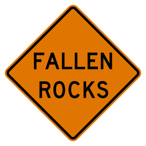 Orange diamond-shaped Fallen Rocks W8-14 construction sign with black text and border.