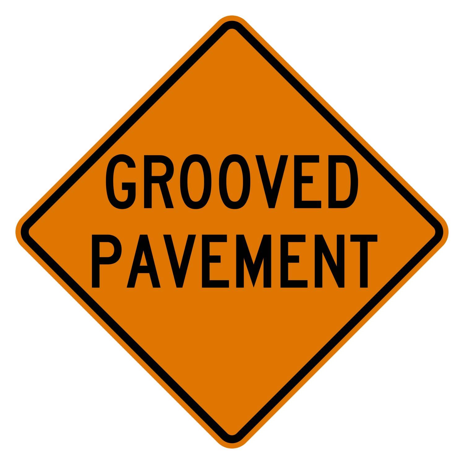 Orange diamond-shaped CW8-15 construction sign with black GROOVED PAVEMENT legend.