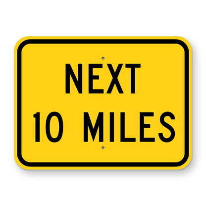 Next 10 Miles Plaque W7-3aP - yellow rectangular plaque reading NEXT 10 MILES in black