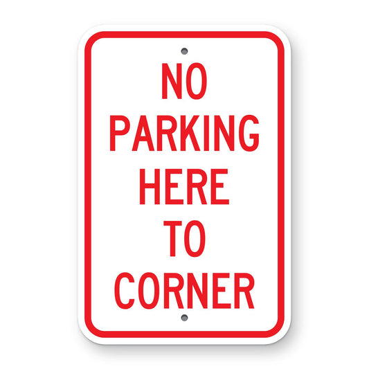 No Parking Here to Corner Sign - white vertical rectangle sign reading NO PARKING HERE TO CORNER in red