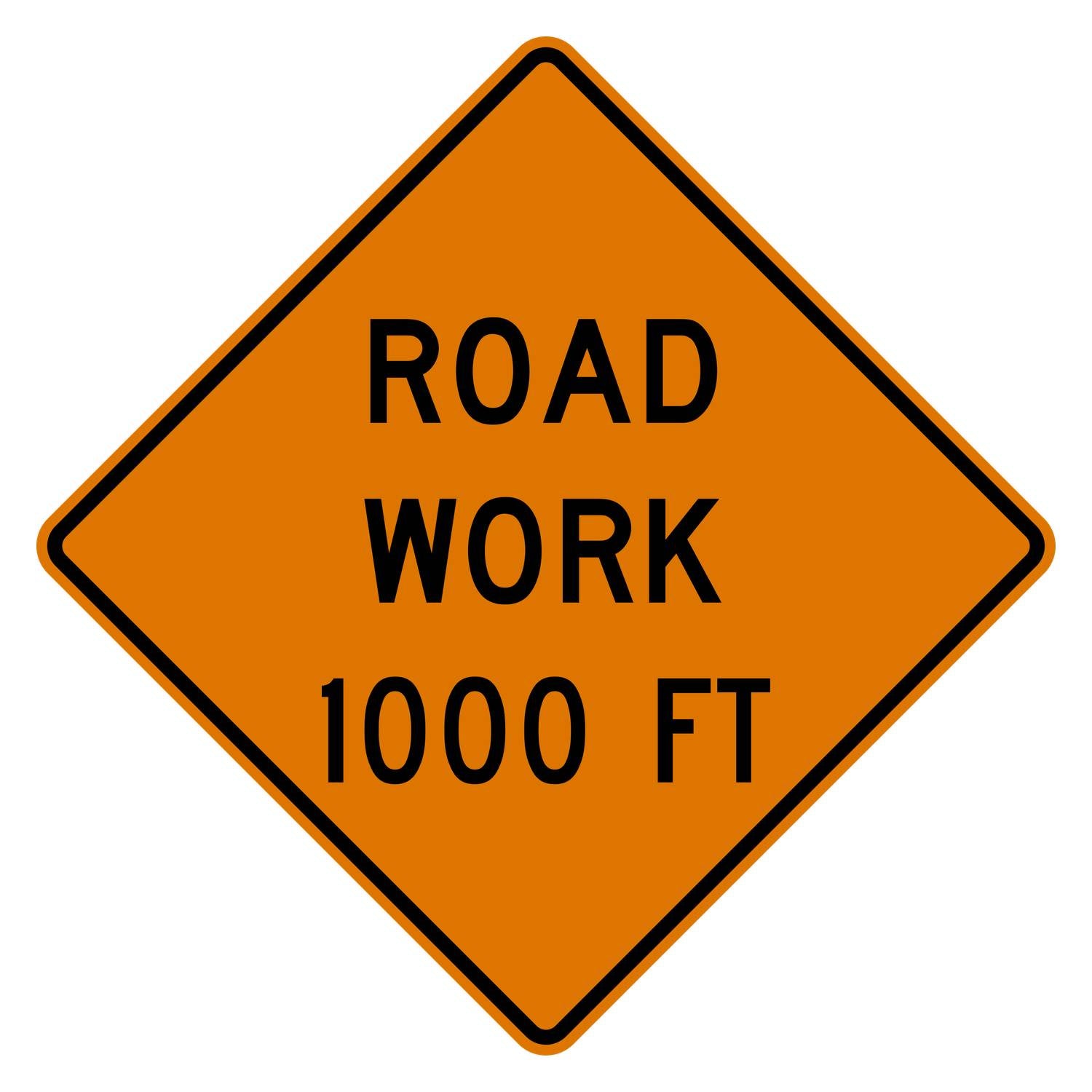 Diamond-shaped fluorescent orange "ROAD WORK 1000 FT" warning sign with black text and border.