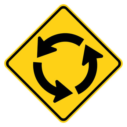 Yellow diamond-shaped W2-6 roundabout warning sign with black circulating arrows symbol.