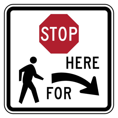 White square sign with black border, red octagonal "STOP" and "HERE FOR" with a right arrow, and pedestrian symbol.