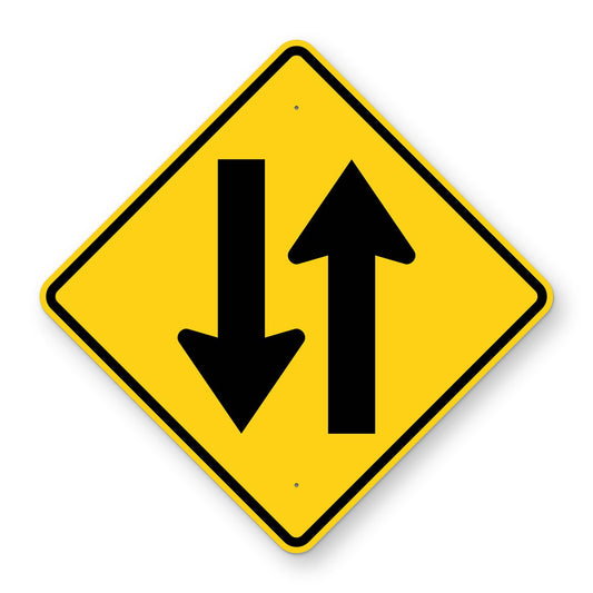 Two Way Traffic Warning Sign W6-3 - yellow diamond sign with black arrows pointing up and down side by side