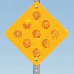 Type 1 Object Marker OM1-1 - yellow diamond marker with nine round yellow reflectors, mounted on a post