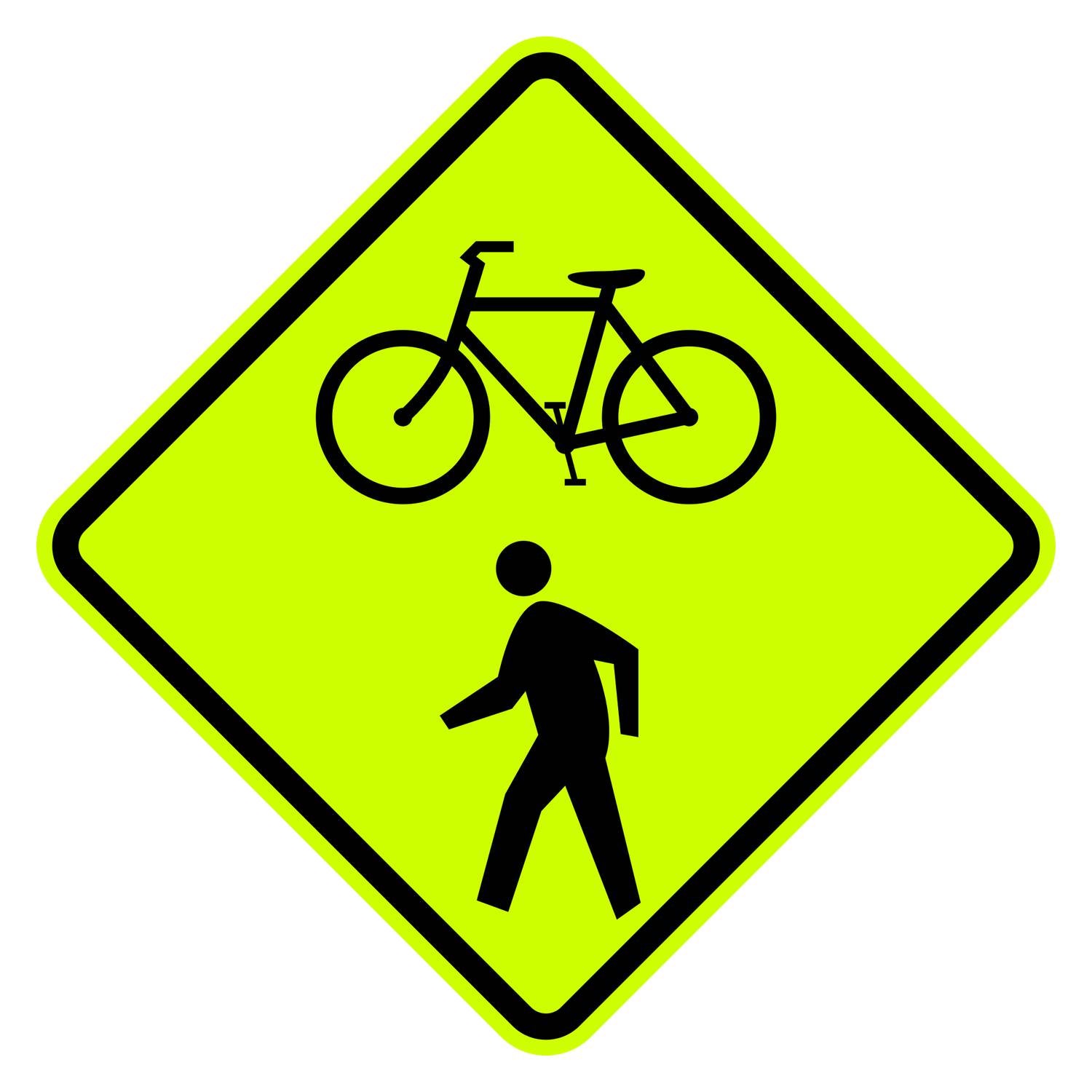 W11-15 diamond-shaped yellow retroreflective sign with black bicycle and pedestrian crossing symbols.