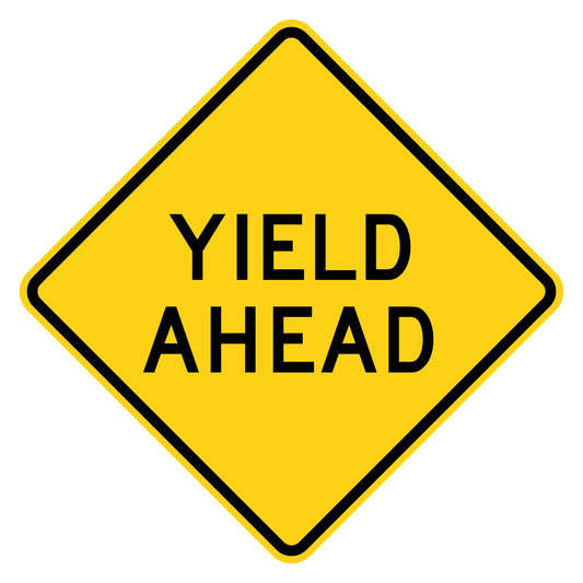 Yellow diamond-shaped W3-2A warning sign with black YIELD AHEAD legend.